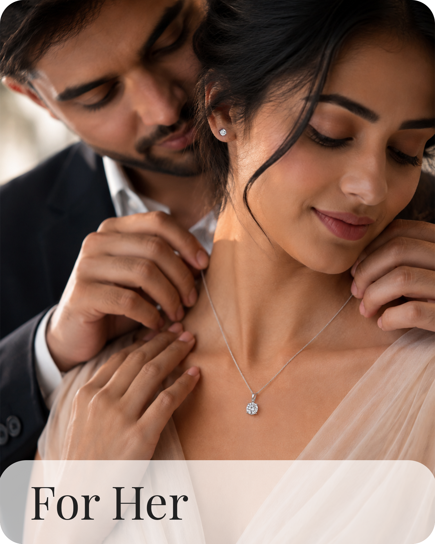 Couple with woman wearing american diamond pendant necklace gift jewelry for her elegant Silver jewelry