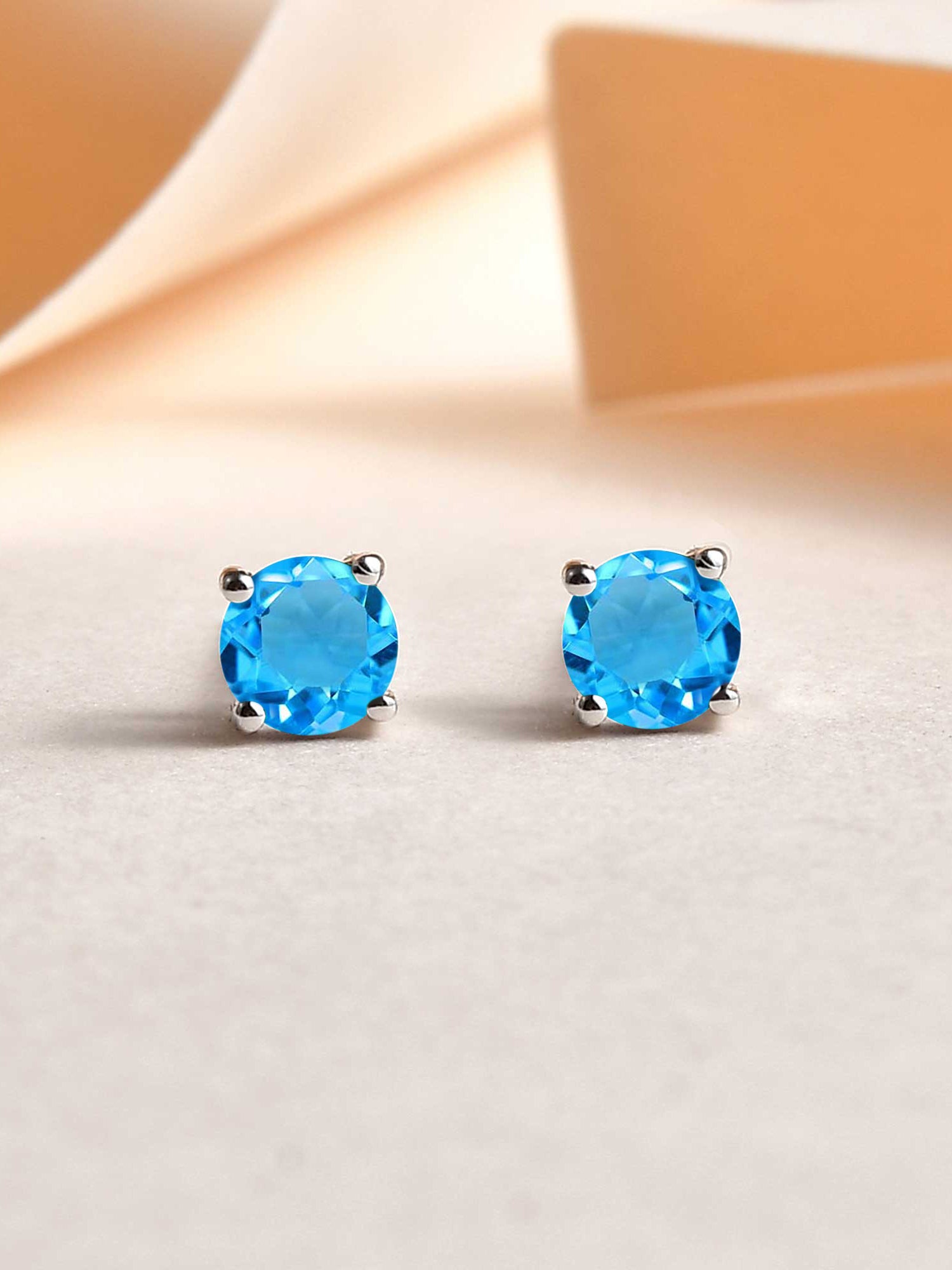 Half Carat Daily Wear Studs In Blue Topaz