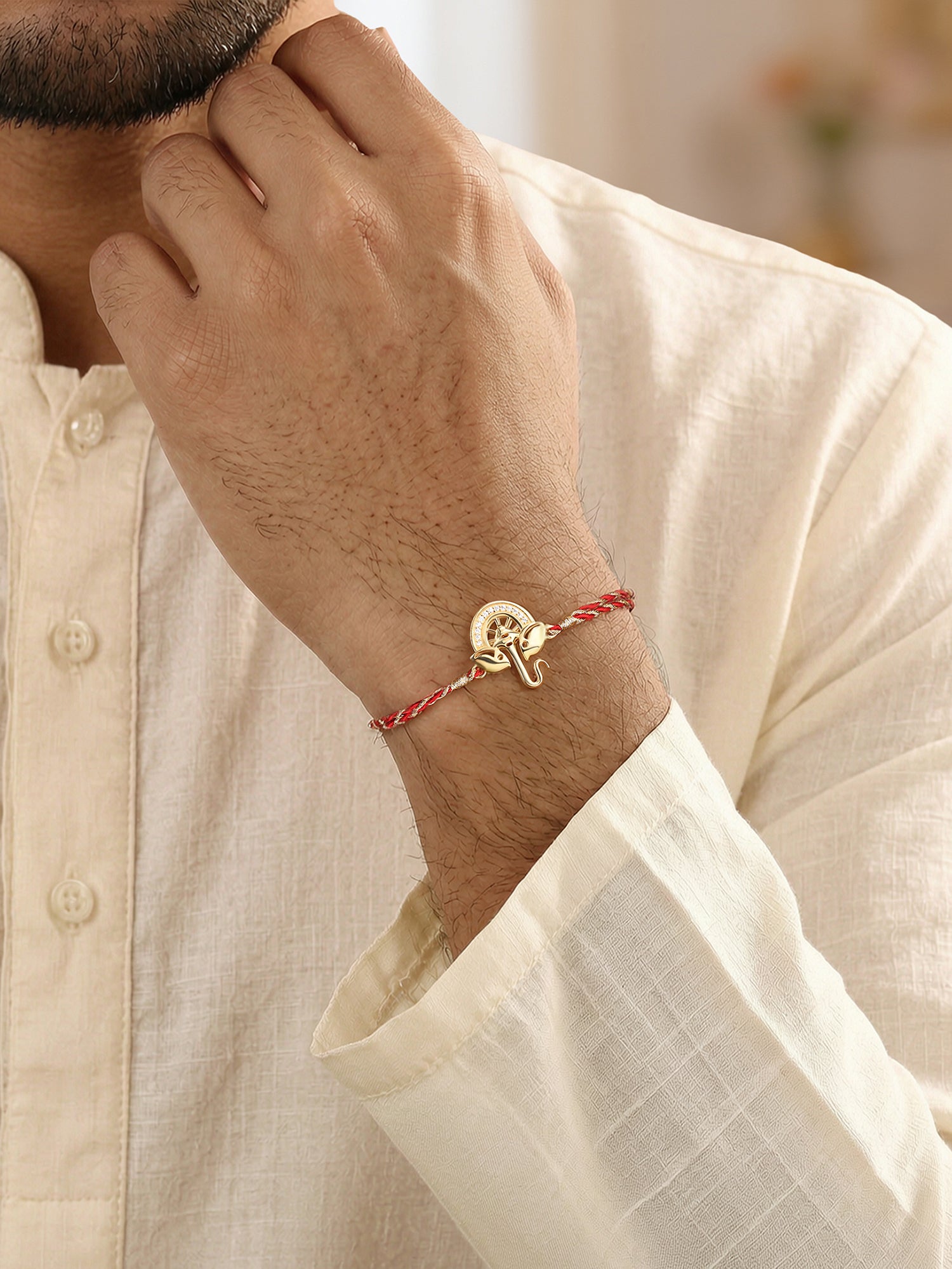 Golden Lord Ganesha Silver Rakhi For Brother