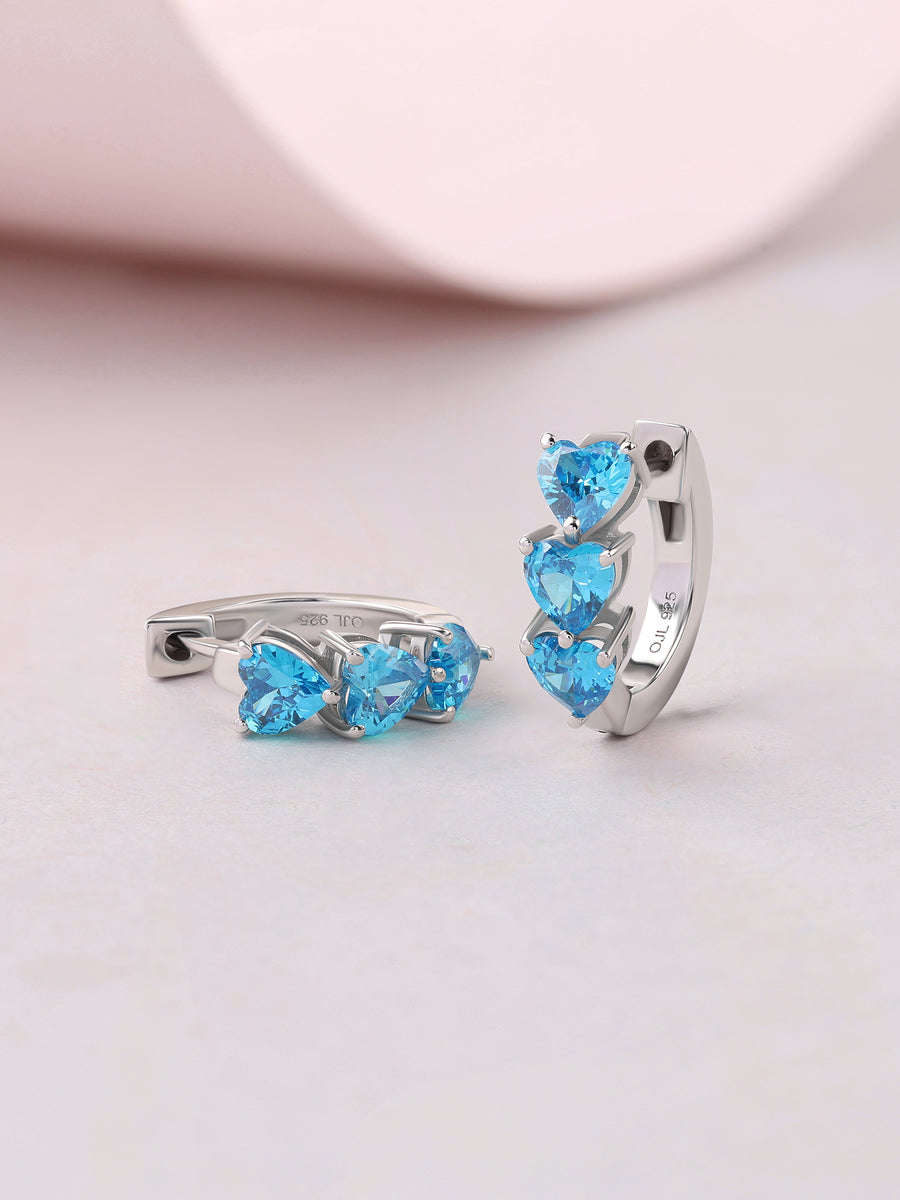 Silver Blue Topaz CZ Twin Heart Huggie Earrings