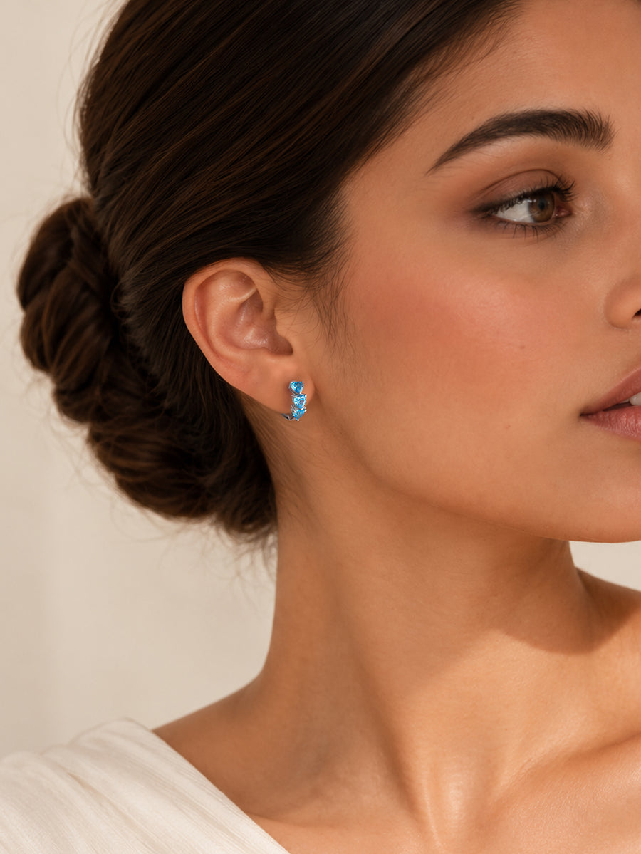 Silver Blue Topaz CZ Twin Heart Huggie Earrings