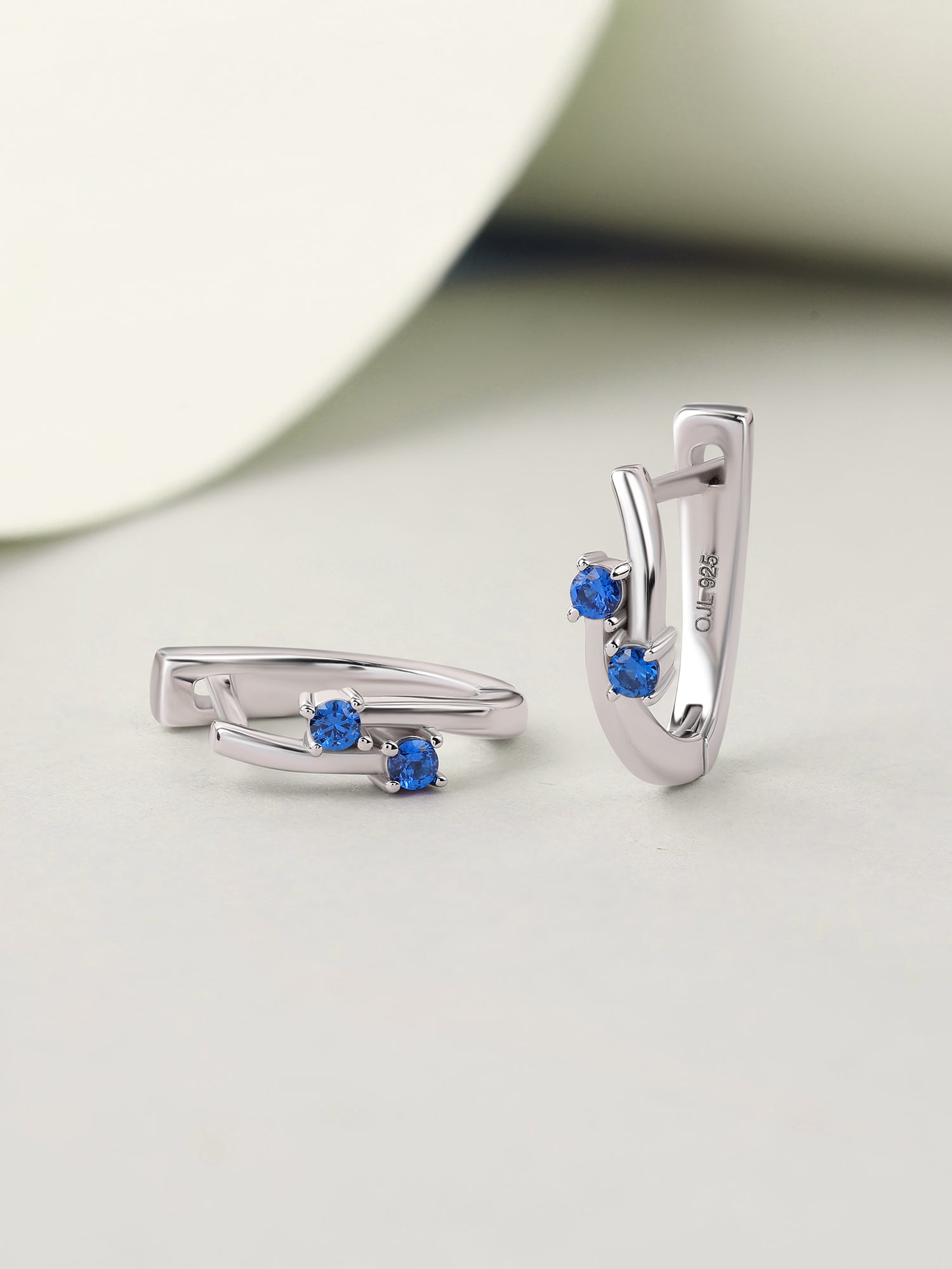 Silver Blue Sapphire CZ Crossover Hoop Earrings