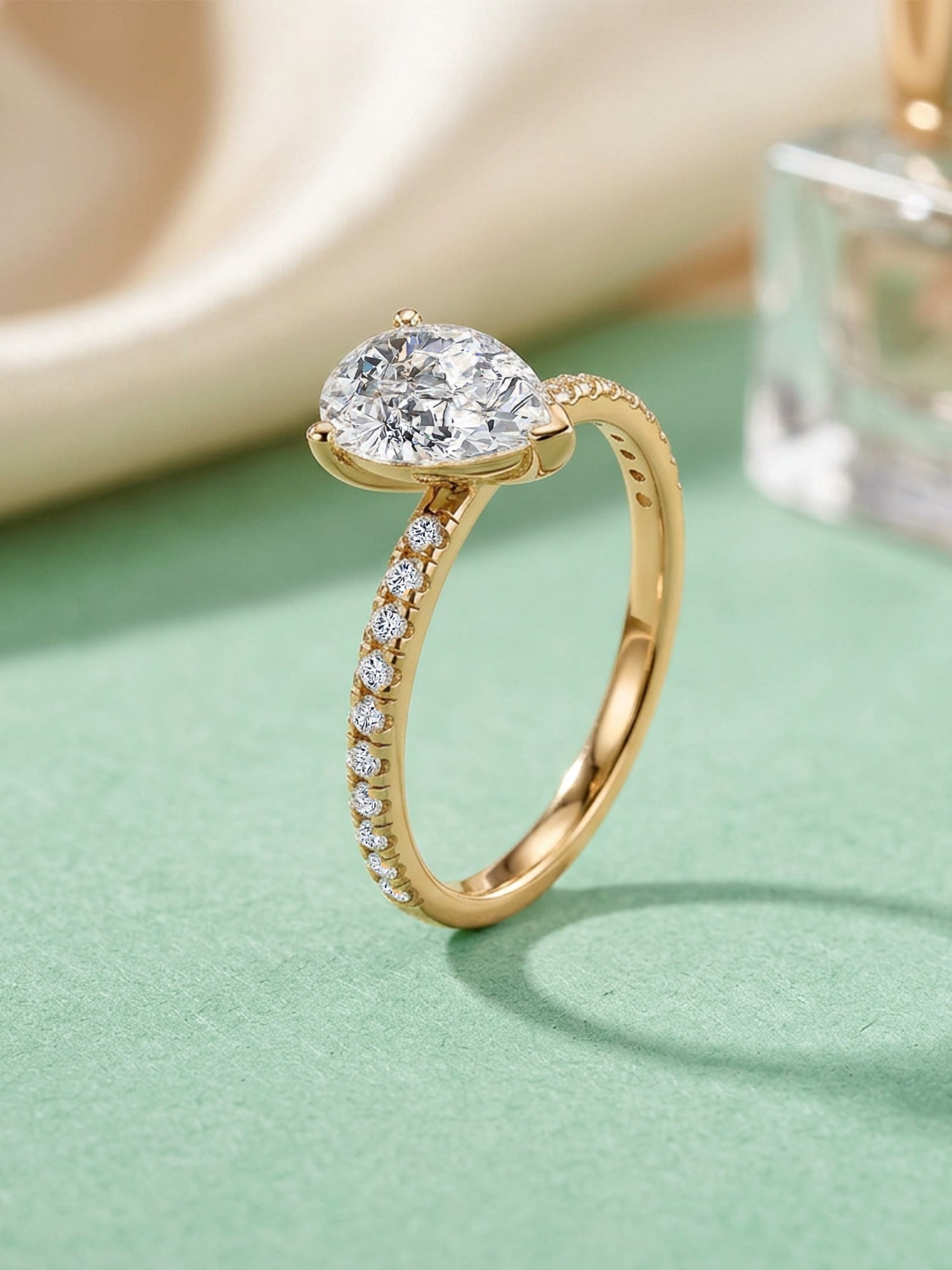 Golden Whisper Pear Diamond Solitaire Ring