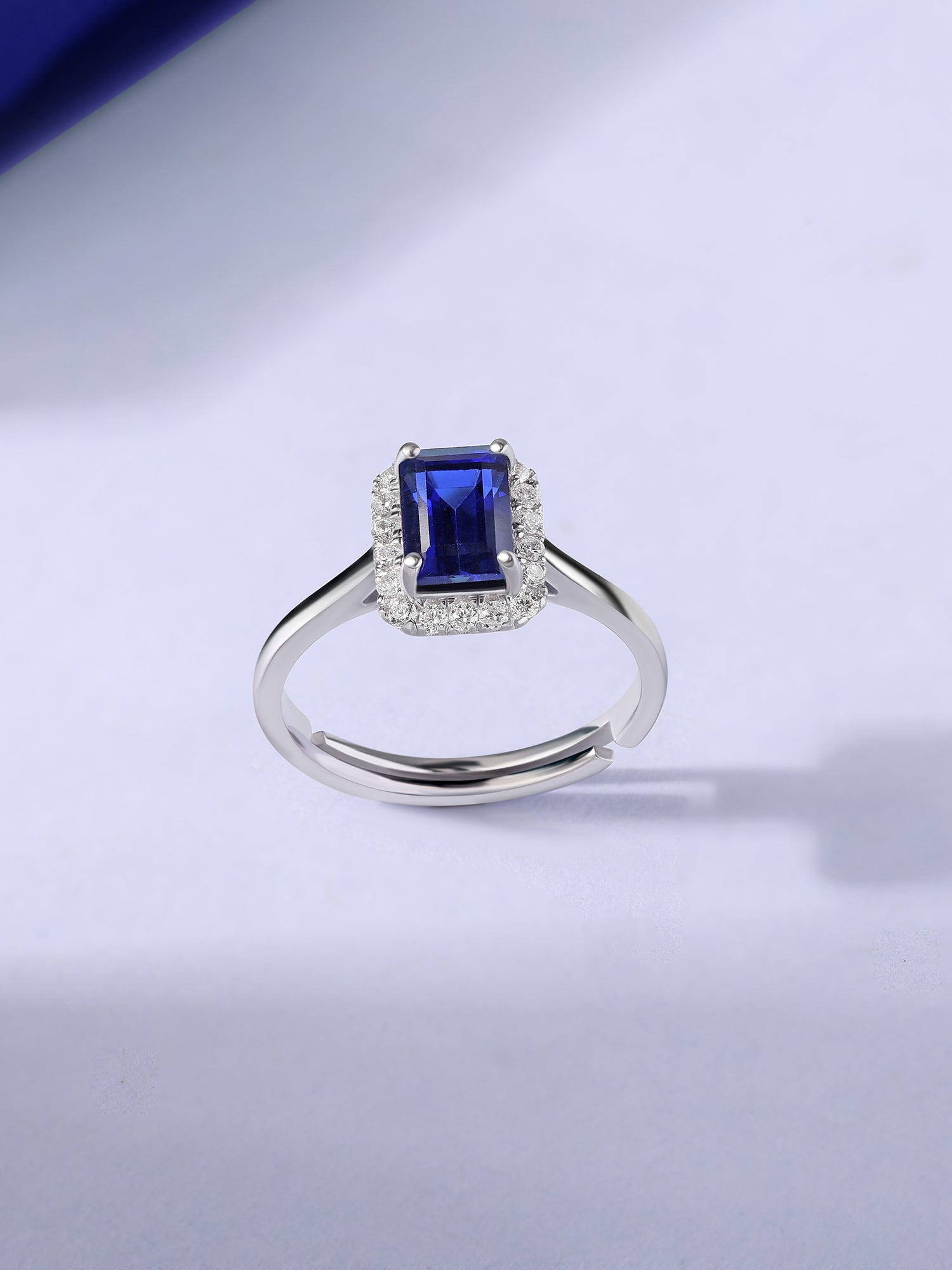 Elegant Blue Sapphire Halo Silver Ring
