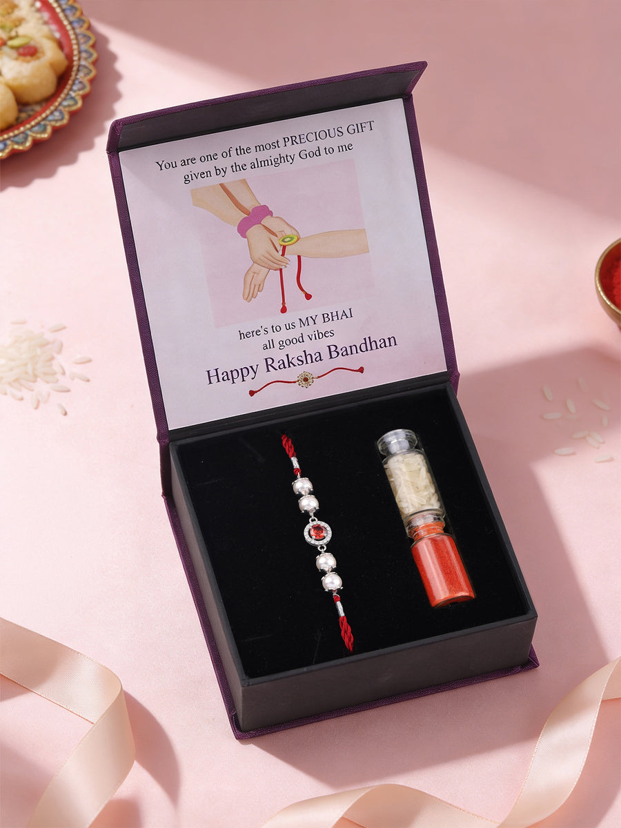 Garnet Glow Pearl Silver Rakhi