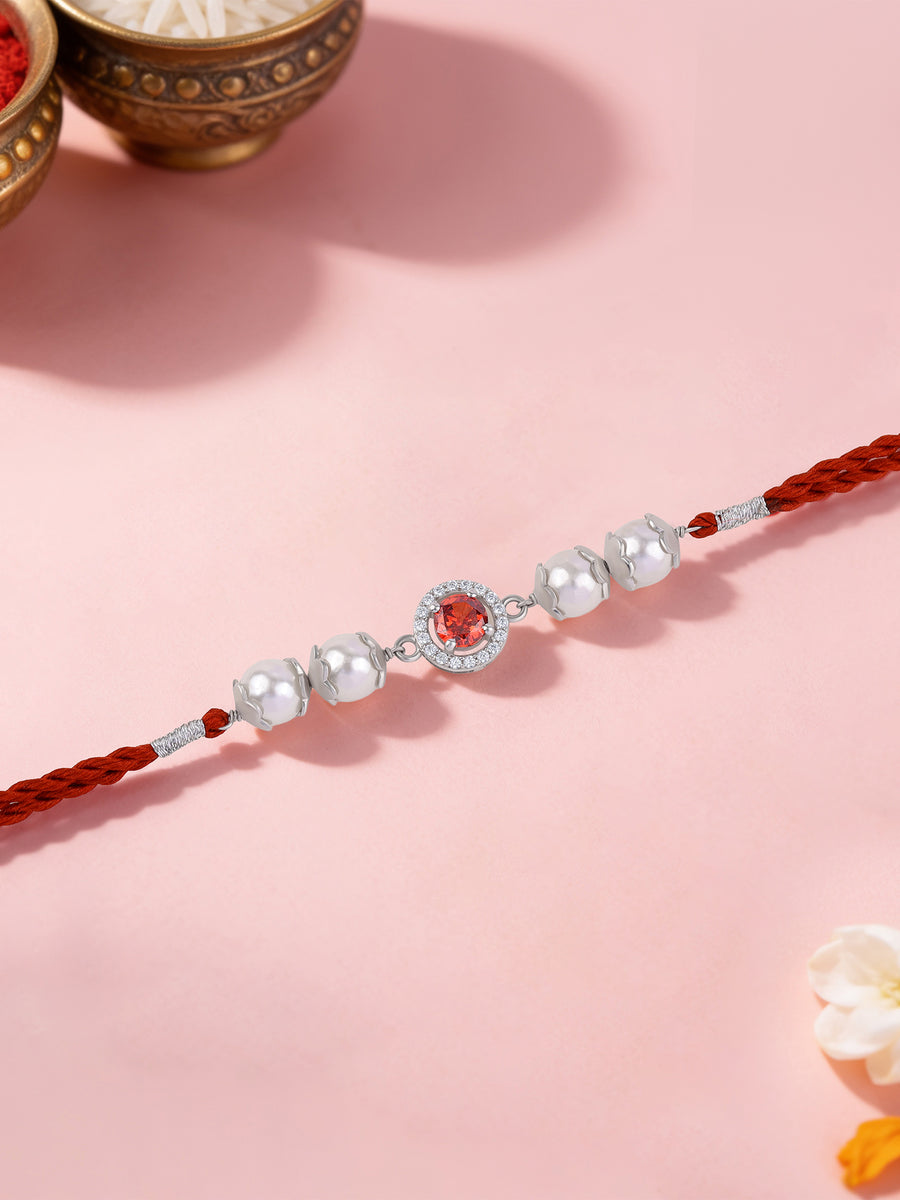Garnet Glow Pearl Silver Rakhi
