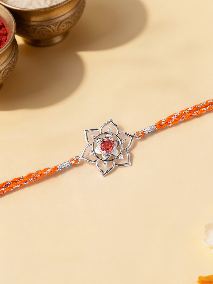 Floral Aura Garnet Silver Rakhi