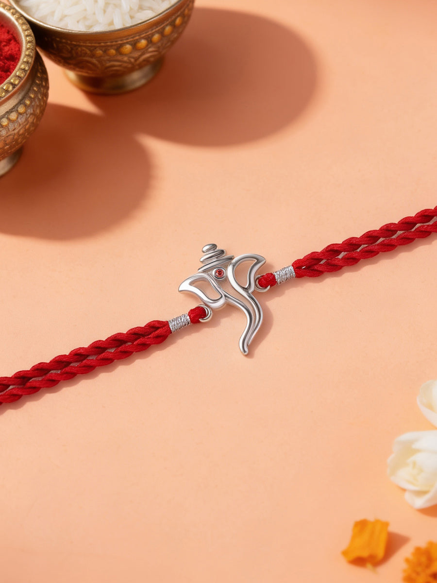 Divine Ganesh Garnet Silver Rakhi