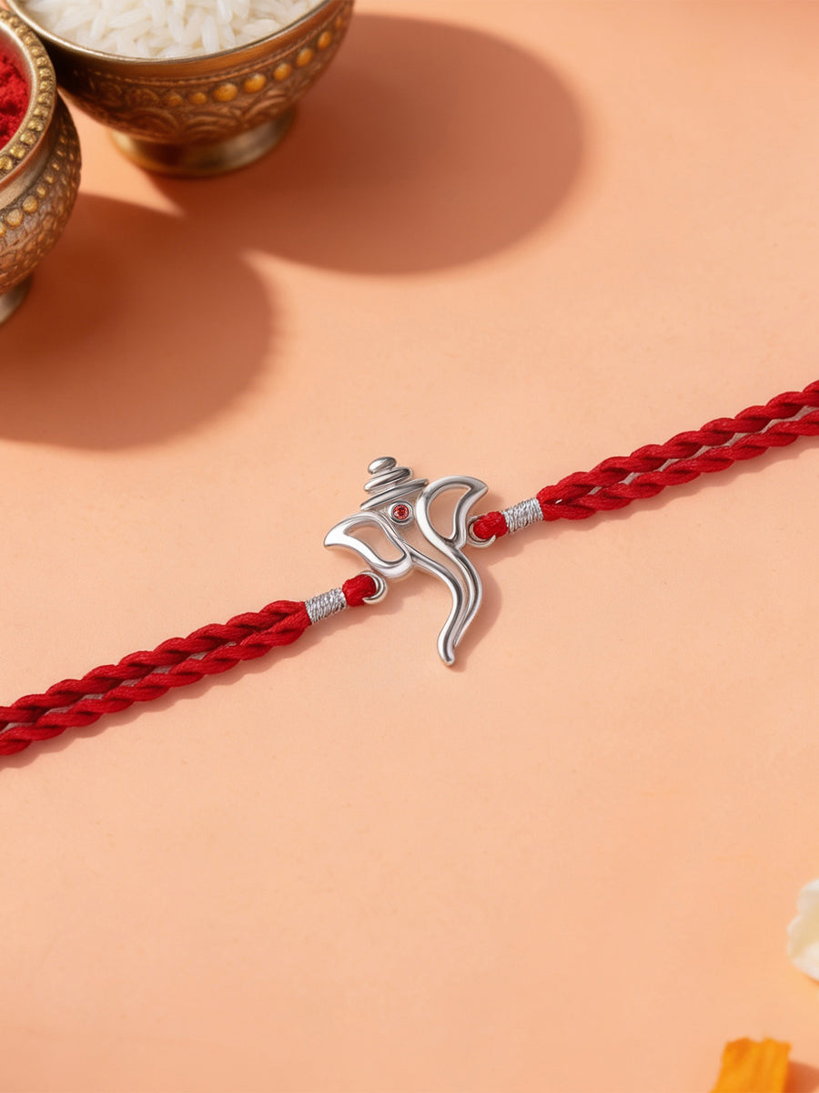 Divine Ganesh Garnet Silver Rakhi
