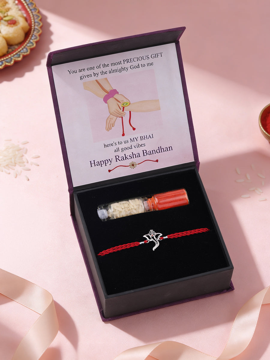 Divine Ganesh Garnet Silver Rakhi