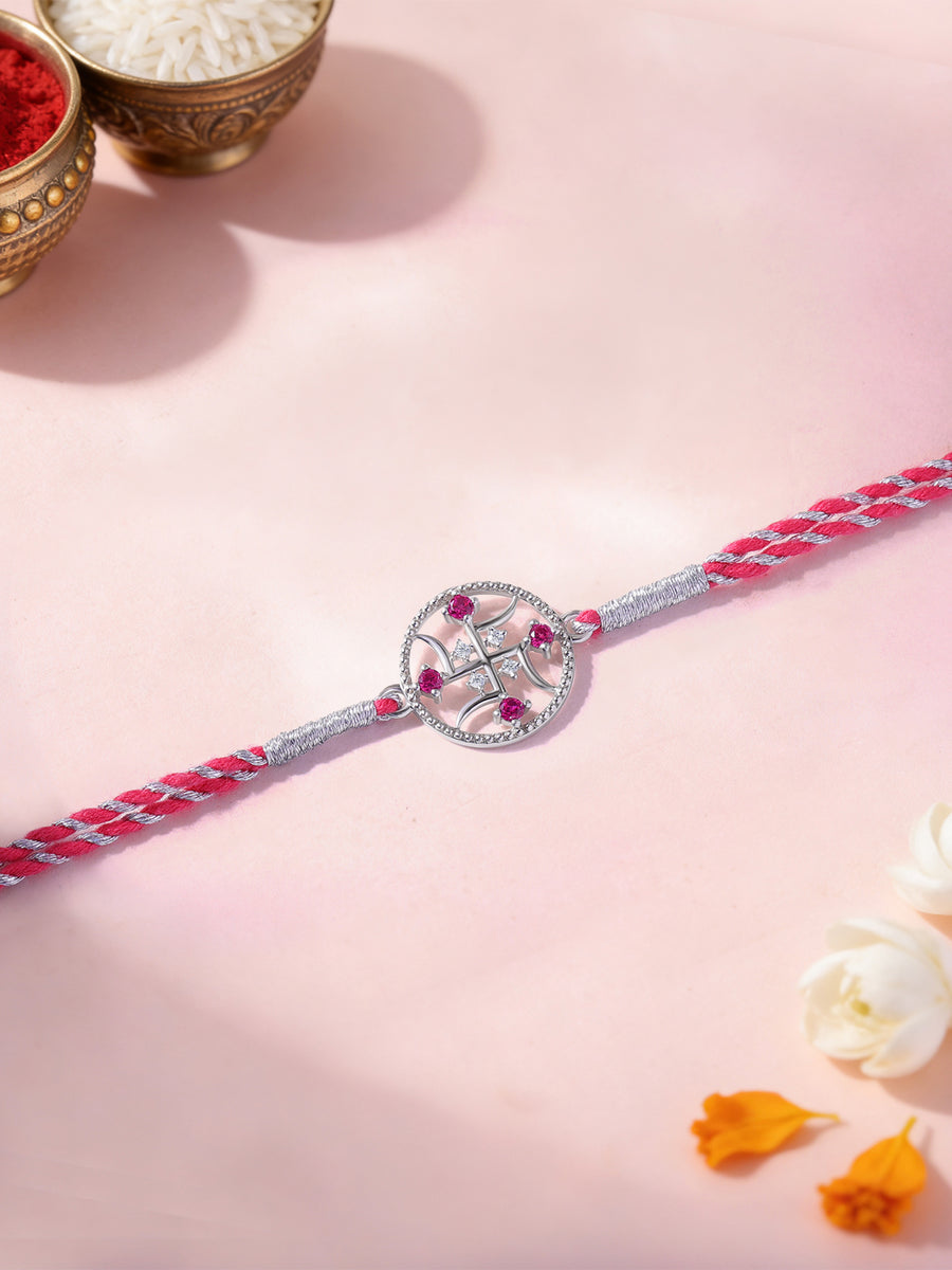 Divine Swastik Ruby Silver Rakhi