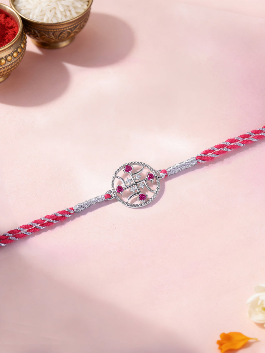 Divine Swastik Ruby Silver Rakhi