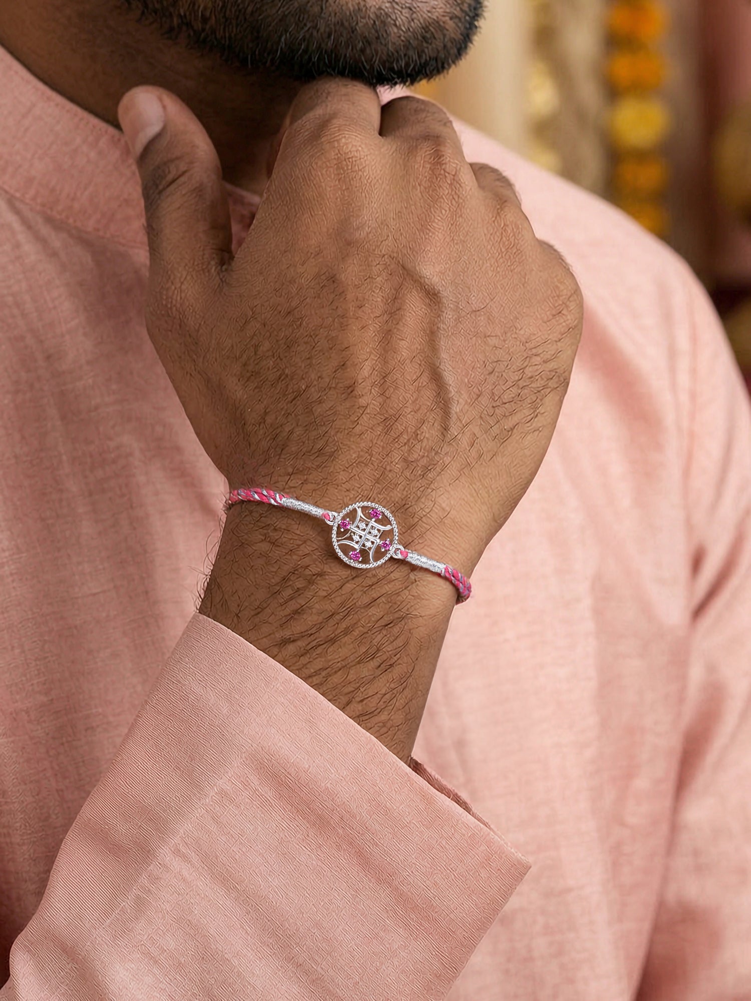 Divine Swastik Ruby Silver Rakhi
